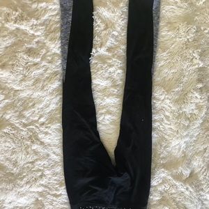 Gray on side of black yoga pants